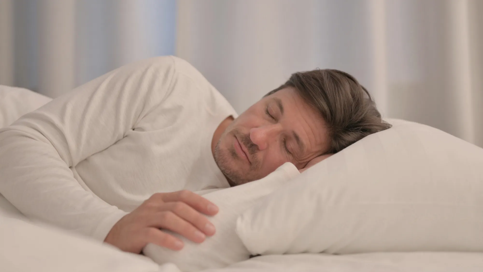 man sleeping on his side