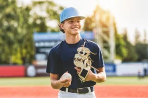Teenager playing baseball